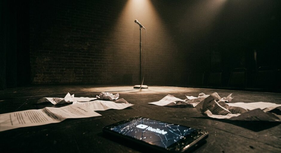 samay raina issue — empty comedy stage with spotlight on microphone representing India's Got Latent controversy